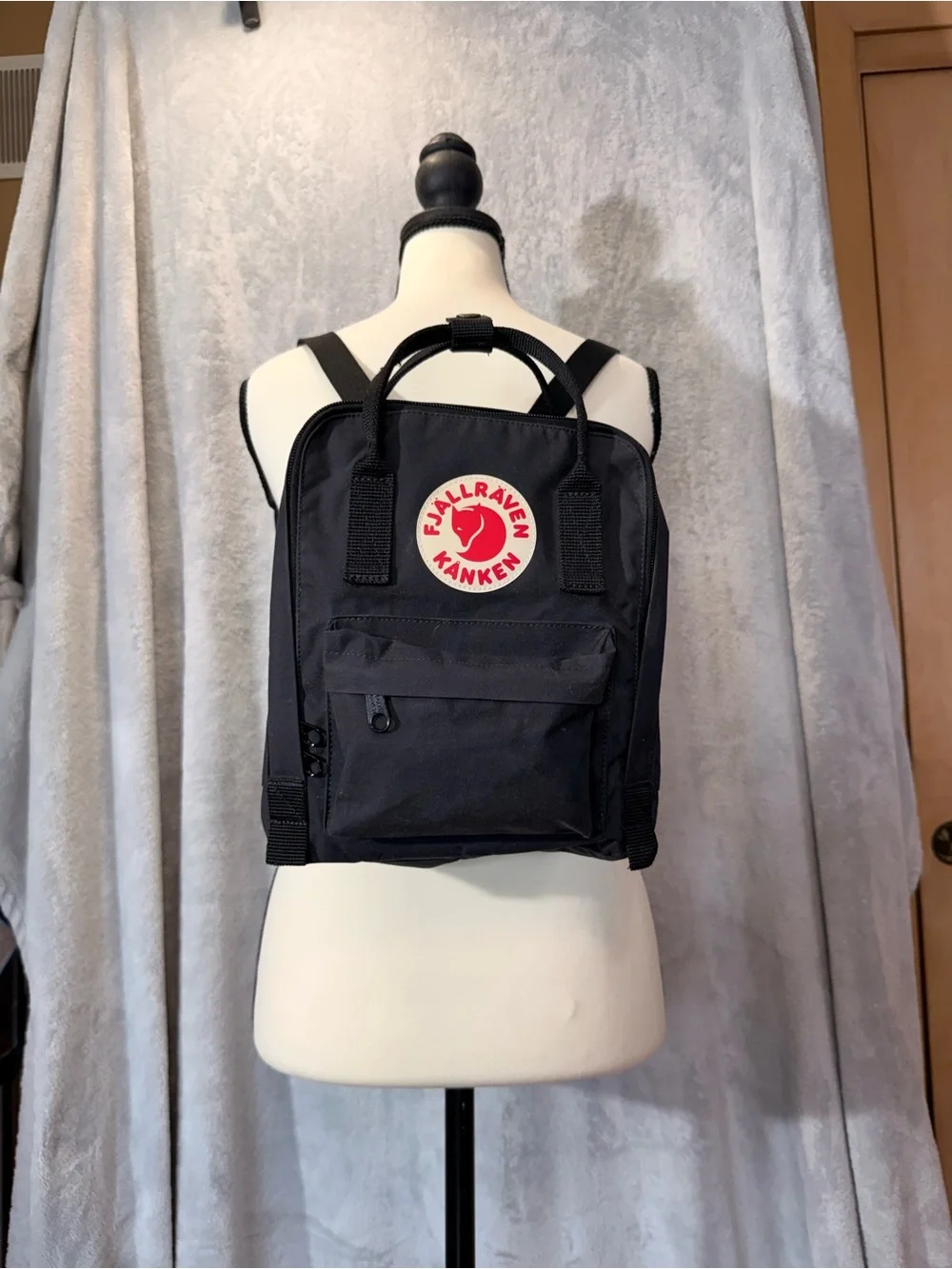Fjallraven Kanken Mini Backpack in Black with Red Logo